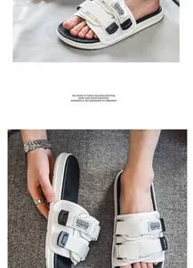 Close-up view of men's white sport slides with adjustable triple velcro straps.