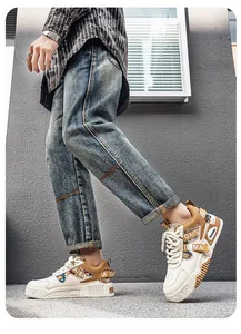 Side view of men's chunky sneakers featuring camo accents and stylish patchwork detail