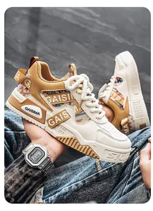 Close-up of beige outdoor chunky sneakers with camo patterns and GAISIMA branding