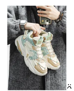 Trendy high-top men's sneakers with mint green paisley pattern and chunky white soles