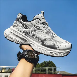 Trendy white and silver men's chunky sneakers with breathable mesh for summer sports.
