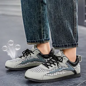 Sneaker traspiranti da uomo in mesh con dettagli grigi e blu per l'uso estivo