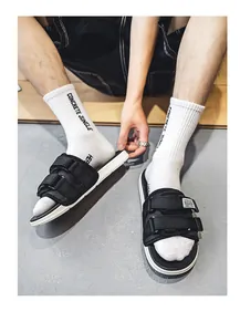 Trendy male teenager sports slides with adjustable velcro straps and anti-slip thick sole