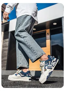 Street style men's outdoor dad sneakers with navy blue panels and thick white soles
