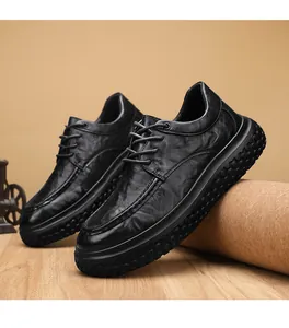 Detailed view of men's black waterproof work shoes with non-slip thick soles