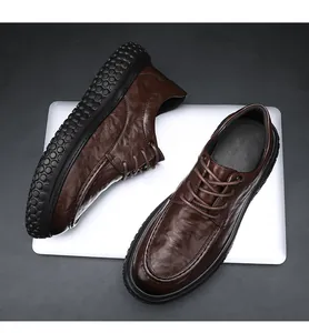 Detailed view of dark brown leather men's work shoes featuring a non-slip thick rubber sole