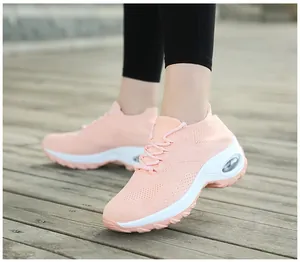 Chaussures de marche flyknit roses pour femmes avec semelle à coussin d'air