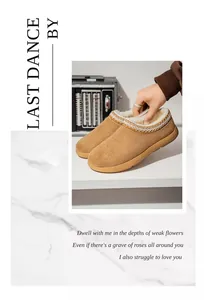 Détail de chaussures pour hommes en daim chaud avec doublure polaire et broderie.