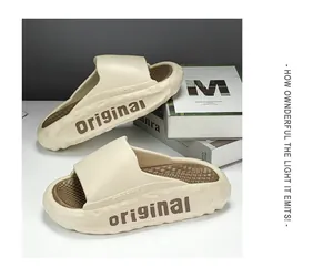Stylish cream-colored thick-sole slippers for men featuring a trendy Original print