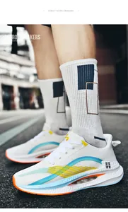 Side view of ultra-light carbon plate running shoes with shock-absorbing cushioned soles
