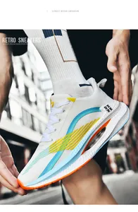 Detailed side view of white carbon plate running shoes with vibrant accents.