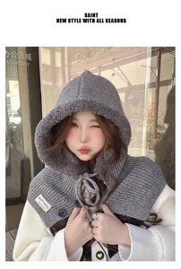 Detailed view of grey knitted balaclava hooded scarf with cozy fleece lining for winter