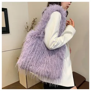 Large purple faux fur tote bag with shaggy fringe design for trendy winter fashion outfits
