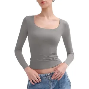 Sexy women's slim fit U-neck long sleeve crop top in solid gray color for Y2k fashion style