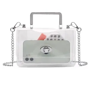 Transparent PVC crossbody bag with silver metal handle and detachable chain strap for stadium