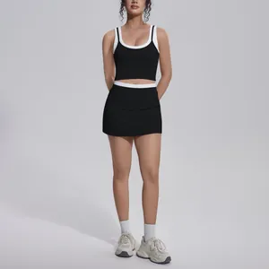 Detail view of a black and white contrast ribbed high-waisted yoga set for fitness.