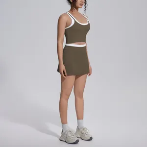 Side view of olive ribbed yoga set with white contrast trim and high-waisted skort