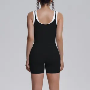 Rear view of black and white ribbed high-waisted yoga set for fitness and sports.