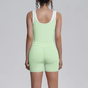 Back view of light green ribbed yoga set with high-waisted shorts for fitness.