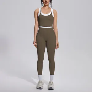 Front view of two-piece olive green and white colorblock yoga set with high waist leggings