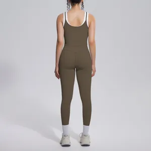Back view of professional brown high-waist contrast yoga set with white trim detail