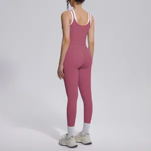 Back view of a mauve high-waisted yoga set with white double straps for fitness