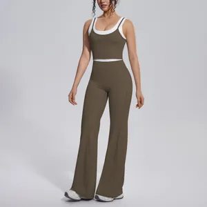 Full length view of olive green color-block yoga set with high-waisted flared pants