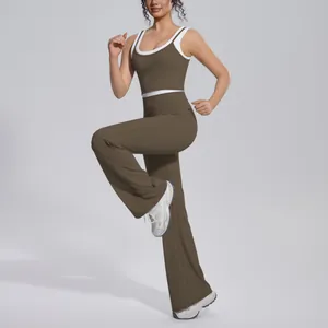Two-piece athletic yoga set featuring a contrast crop top and high-waisted flare pants