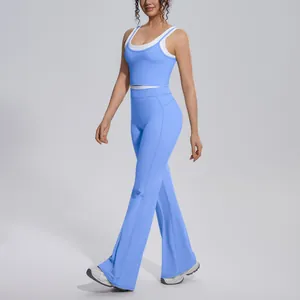 Full body view of a light blue yoga set with white trim, featuring flared leggings.