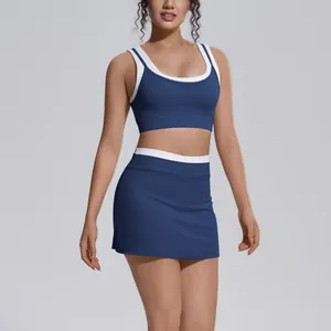 Close-up of contrast color blue yoga set with ribbed fabric and high waist skirt