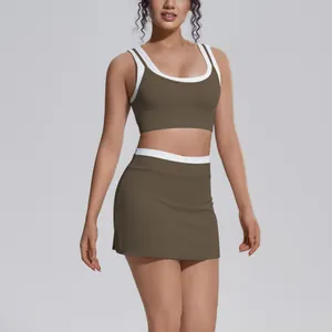 Two-piece olive green athletic set with white trim featuring ribbed sports bra and skirt