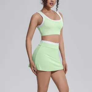 Detailed view of the mint green ribbed yoga set featuring a contrast white border