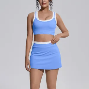 Full view of blue contrast ribbed sports bra and mini skirt set for outdoor fitness