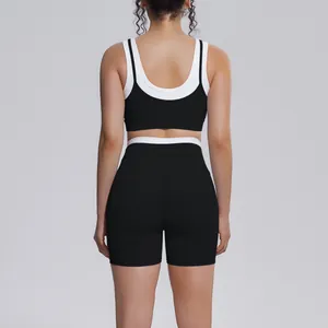 Detail of back view of ribbed high-waisted yoga set with color-block bra and shorts