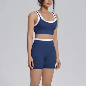 Detailed view of the color-block blue and white yoga set with high-waisted shorts