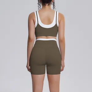 Back view of a stylish two-piece olive green and white ribbed yoga set for women