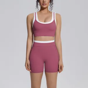 Close-up of color-blocking yoga set featuring a sports bra and high-waist shorts