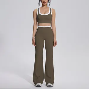 Full body view of olive green yoga set with contrast white trim and flare pants