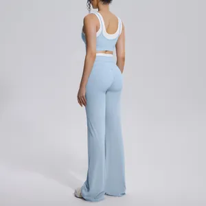 Back view of light blue color-blocking high waist yoga set for fitness and active sports.