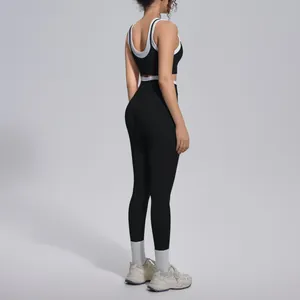 Detailed back view of a black ribbed high-waist yoga set with white trim