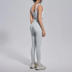 Side view of grey color-contrast naked-feel yoga bra and high-waist leggings set