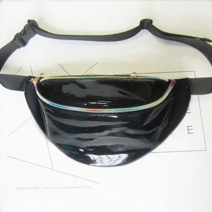 Close-up of black shiny waist bag with iridescent rainbow zipper detail for women.