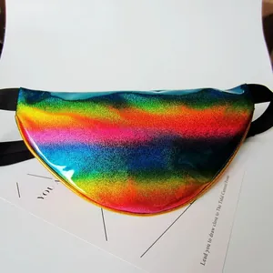 Fashionable holographic iridescent waist bag in shiny PVC with adjustable strap.