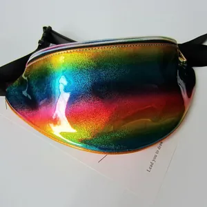 Close-up of vibrant holographic iridescent texture on a reflective PVC fanny pack