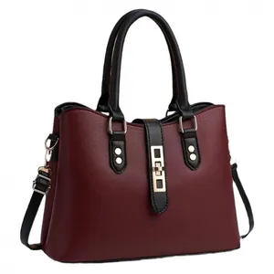 Elegant burgundy textured leather handbag with gold hardware for women's daily fashion