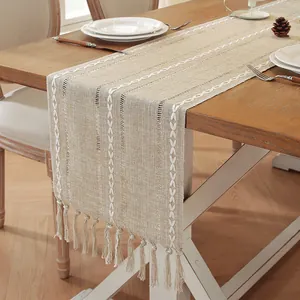 Rustic cotton linen table runner with white embroidery and tassels for dining room