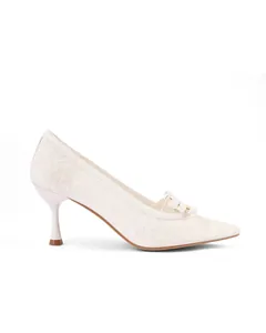 Side view detail of elegant white lace pointed toe pumps with stiletto heels and bow.