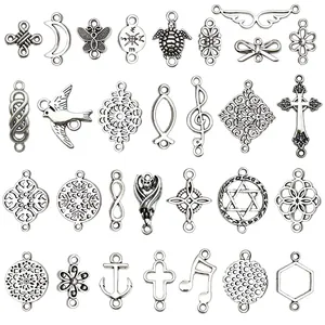 Collection of antique silver alloy charms and jewelry connectors for DIY jewelry