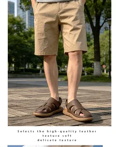 Detail of men's leather outdoor sandals with handmade stitching in urban setting
