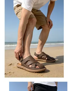 Detail view of men's brown outdoor beach sandals with handmade stitching on the shore.